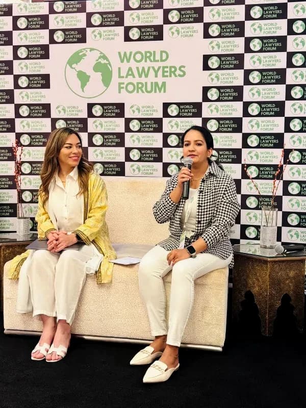 Two speakers in conversation at WLF Bahrain 2025
