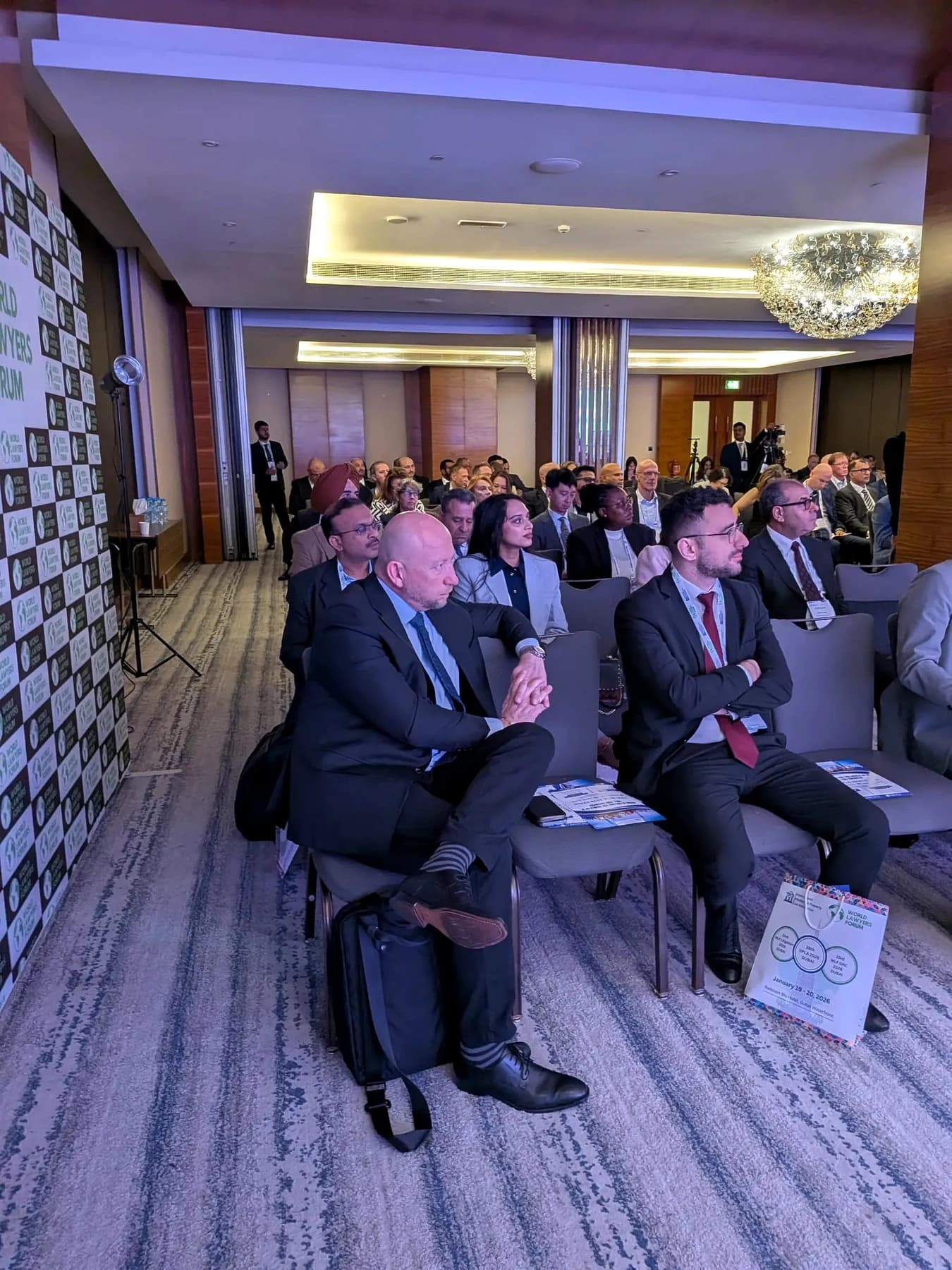 Attendees watching a WLF Dubai 2026 session